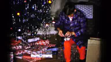 Hagerstown Maryland USA (1959): Woman Opening Present Next To Christmas Tree Cuts