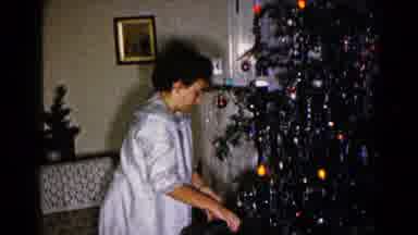 Hagerstown Maryland USA (1959): Mom Opens Her Present On Christmas Morning