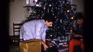 Hagerstown Maryland USA (1959): A Girl Bending Over To Open The Male And A Boy