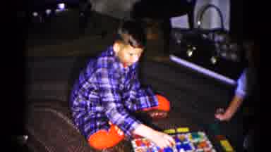 Hagerstown Maryland USA (1959): Children In Pyjamas Play A Board Game On The Floor