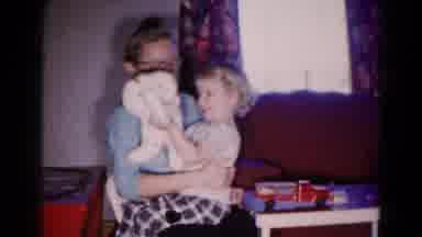 Hagerstown Maryland USA (1959): The Children Is Playing Having Toy In The Hand