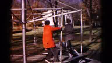 Hagerstown Maryland USA (1959): Two Older Children Make A Playground Merry Go