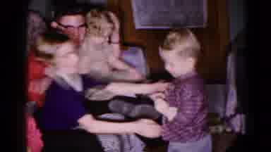 Hagerstown Maryland USA (1959): The Small Girl Taking A Boy On Her Lap For Photo