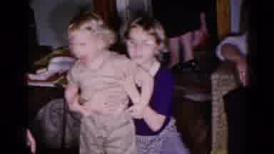 Hagerstown Maryland USA (1959): Four Children Playing In Pairs Around An Adult