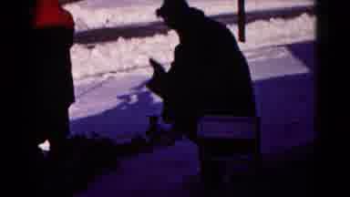 Hagerstown Maryland USA (1959): Person Removing Shoes While Sitting On A Bench In