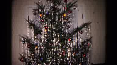 Hagerstown Maryland USA (1959): A Christmas Tree Is Fully Decorated By The Person