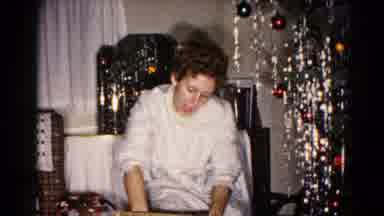 Hagerstown Maryland USA (1959): The Lady Was Opening The Gift Near The Christmas