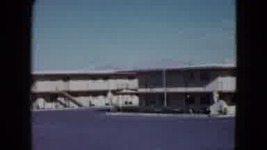 Nevada USA (1959): Slow Panning Shot Of Old Motel From Across Parking Lot With Old