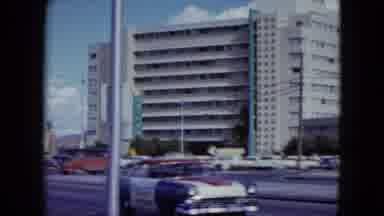 Nevada USA (1959): Vintage Cars Driving On The Road With A View Of Surrounding