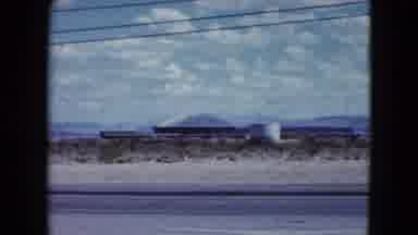 Nevada USA (1959): A Car Is Moving And The Two Cars Were Going Parallel In The