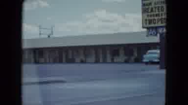 Nevada USA (1959): Hotel Person Walking By And A Car Driving By