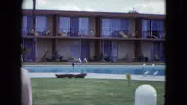 Nevada USA (1959): Well Dressed People Standing Around And Walking By A Mid