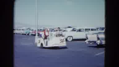 Nevada USA (1959): A Man Riding A Lady Invaded Little Car To Find Her Car