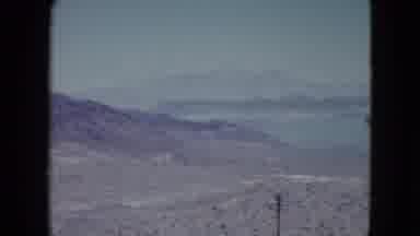 Nevada USA (1959): View Dry Uninhabited Area Without Plants Warm Air With Lake In