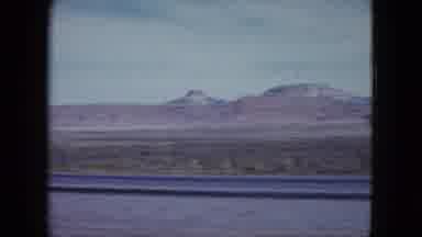 Nevada USA (1959): Film From Moving Vehicle Of Plains With Mountains In The