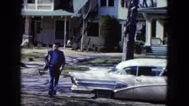 Nevada USA (1959): Man Gets Out Of Car And Walks Behind His Father From The Garden