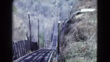 Nevada USA (1959): View Of Descending Train Tracks Holland Green Trees On A Clear