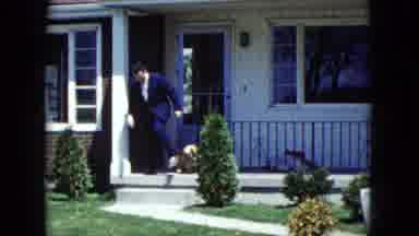 Nevada USA (1959): Man Wearing A Nice Suit Walking Over A Lazy Dog That Was
