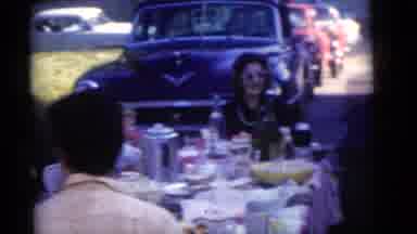Camden New Jersey (1960): A Group Of Men And Women Are Sitting Around Eating