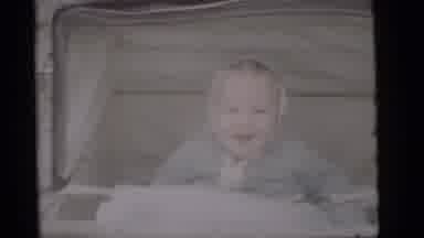 Camden New Jersey (1960): A Little Child Is Laughing And Enjoying And Relaxing
