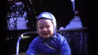 Camden New Jersey (1960): Baby Boy Sitting Down In A Chair That Looks Like Its
