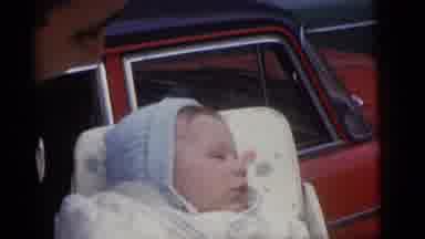 Camden New Jersey (1960): Dad Holds Baby Boy In A Carrier Near A Busy Street In
