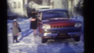 Camden New Jersey (1960): Adults And Children Walking In The Snow Next To A Car