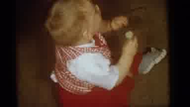 Camden New Jersey (1960): A Toddler Boy That Happily Waves His Arms Back And Forth