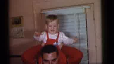 Camden New Jersey (1960): Baby Boy Sitting On Smiling Dad's Shoulders And Wiggling