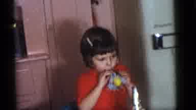 Camden New Jersey (1960): Girl Blowing Up Balloon Cuts To Toddler In A High Chair