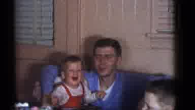 Camden New Jersey (1960): Man In Blue Shirt With Infant By A Table With A Cake And