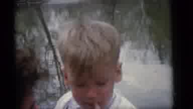 Camden New Jersey (1960): White Kid Outside By A Body Of Water With His Mama