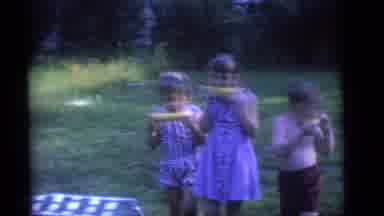 Camden New Jersey (1960): A Whole Group Of Kids Walking Together And Eating Corn