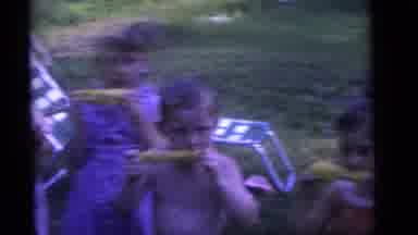 Corny kids congregate at the park to chomp and romp!