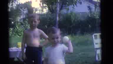 Camden New Jersey (1960): A Boy Is Having A Ball To Play With Others In The Garden