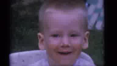 Camden New Jersey (1960): A Child With Food All Over Their Mouth Smiling And