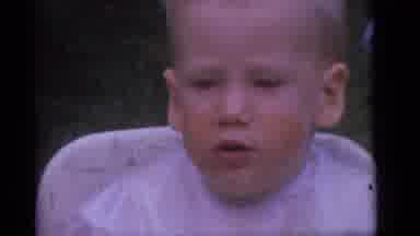 Camden New Jersey (1960): Man Wearing White Shirt Talks To Baby Sitting In White