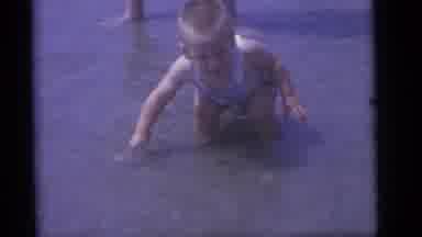 Camden New Jersey (1960): A Little Boy Playing And Enjoying In Water Somewhere