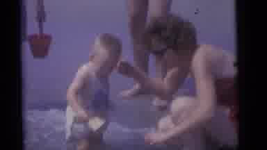 Camden New Jersey (1960): The Mother Is Holding Her Baby On The Water In The Side