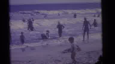 Camden New Jersey (1960): Groups Of People Swimming In The Waves Of The Ocean As