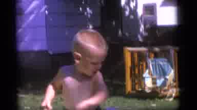 Camden New Jersey US (1960): A Child Plays With An Inflatable Water Ring In An