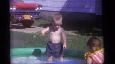 Camden New Jersey US (1960): Three Kids In A Small Inflatable Pool And A Mother