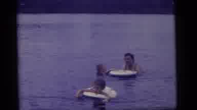 Camden New Jersey US (1960): A Woman And Two Children Playing In The Water With