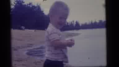 Camden New Jersey US (1960): Toddler Boy At The Shore Of A Lake In The Middle Of