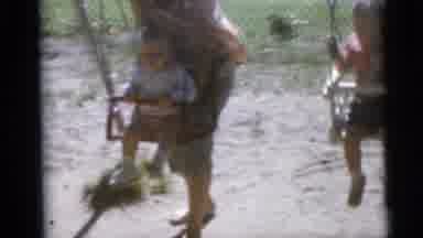 Camden New Jersey USA (1960): The Three Child Are Swinging In The Park With The