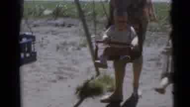 Camden New Jersey USA (1960): Three Young Children Swinging On Swings At The Park