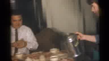Camden New Jersey USA (1960): A Lady Is Pouring The Water Into The Glass And The