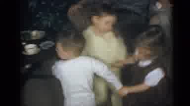 Camden New Jersey USA (1960): Three Children Play Ring Around The Rosy In The