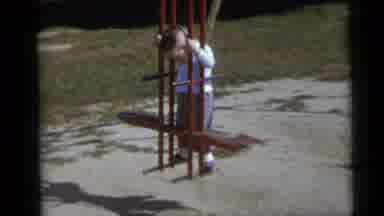 Camden New Jersey USA (1960): Kid Playing In Swing
