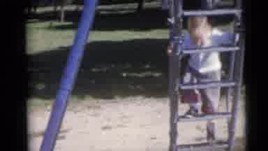 Camden New Jersey USA (1960): One Baby Playing In The Park On The Hight Of The